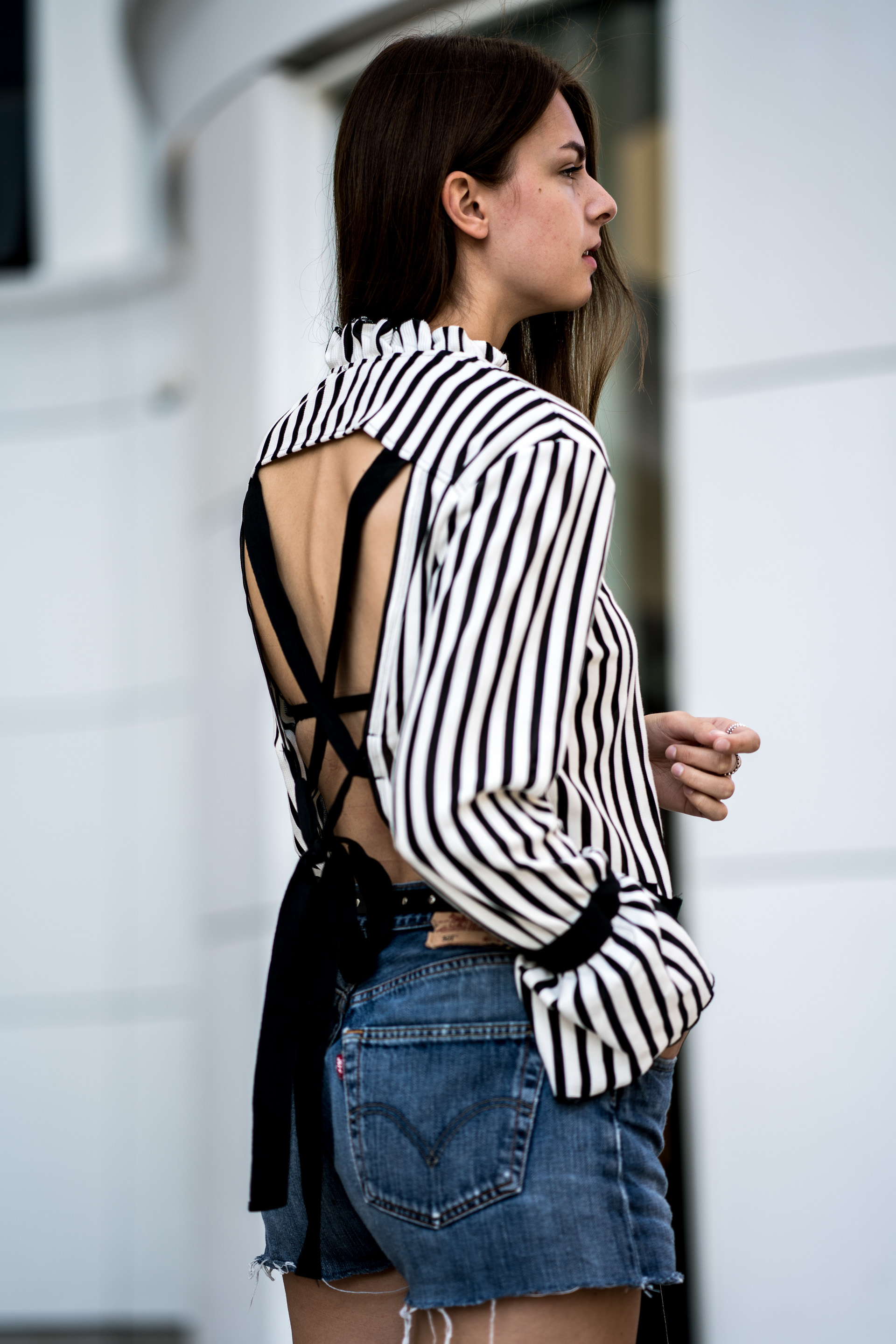 A striped shirt with that certain something || open back shirt