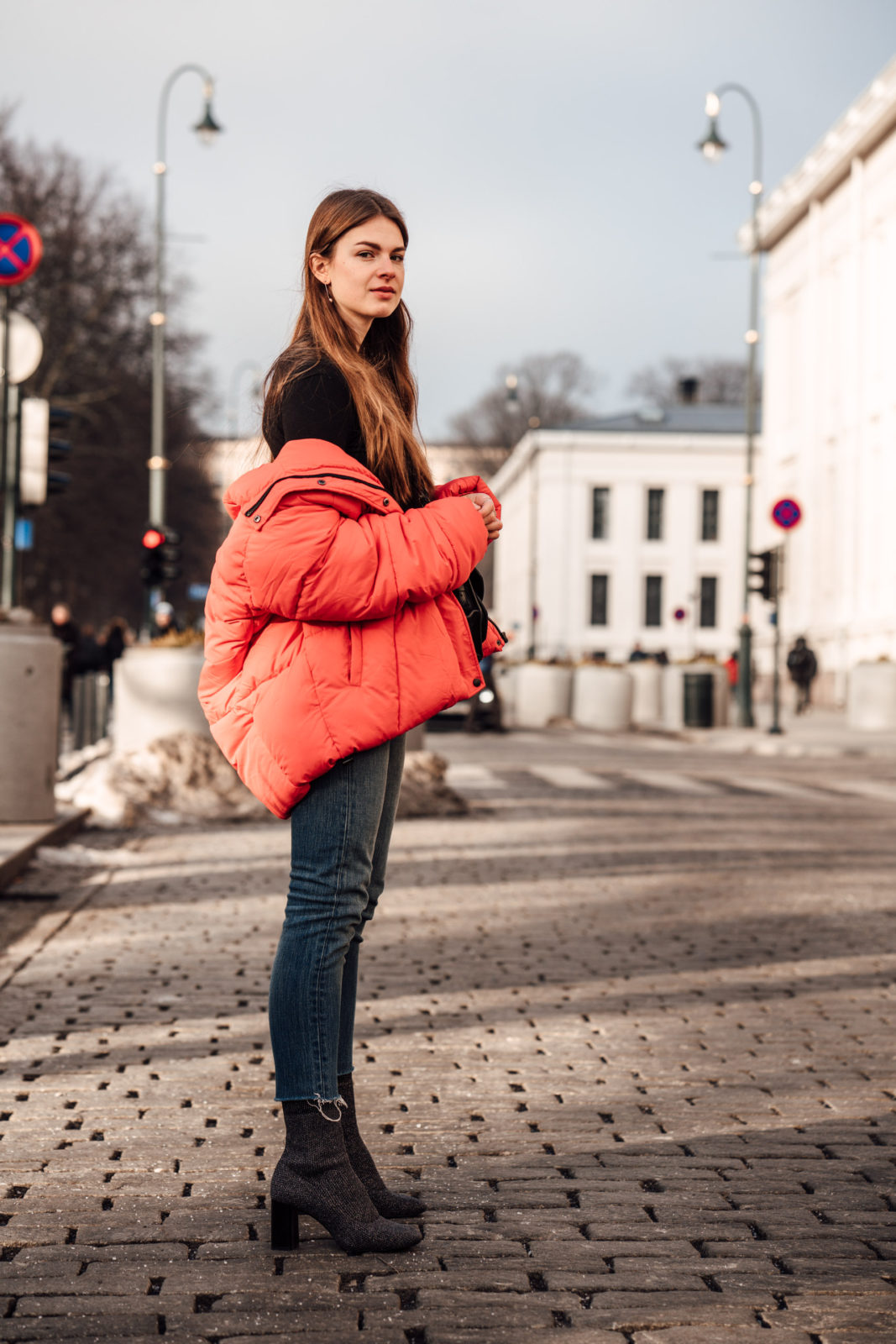 Oslo Runway Outfit: A casual chic way to wear a red puffer jacket