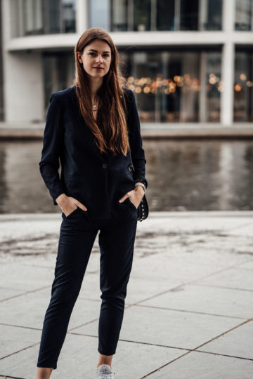 Casual Chic Outfit: Women's suit combined with sneakers