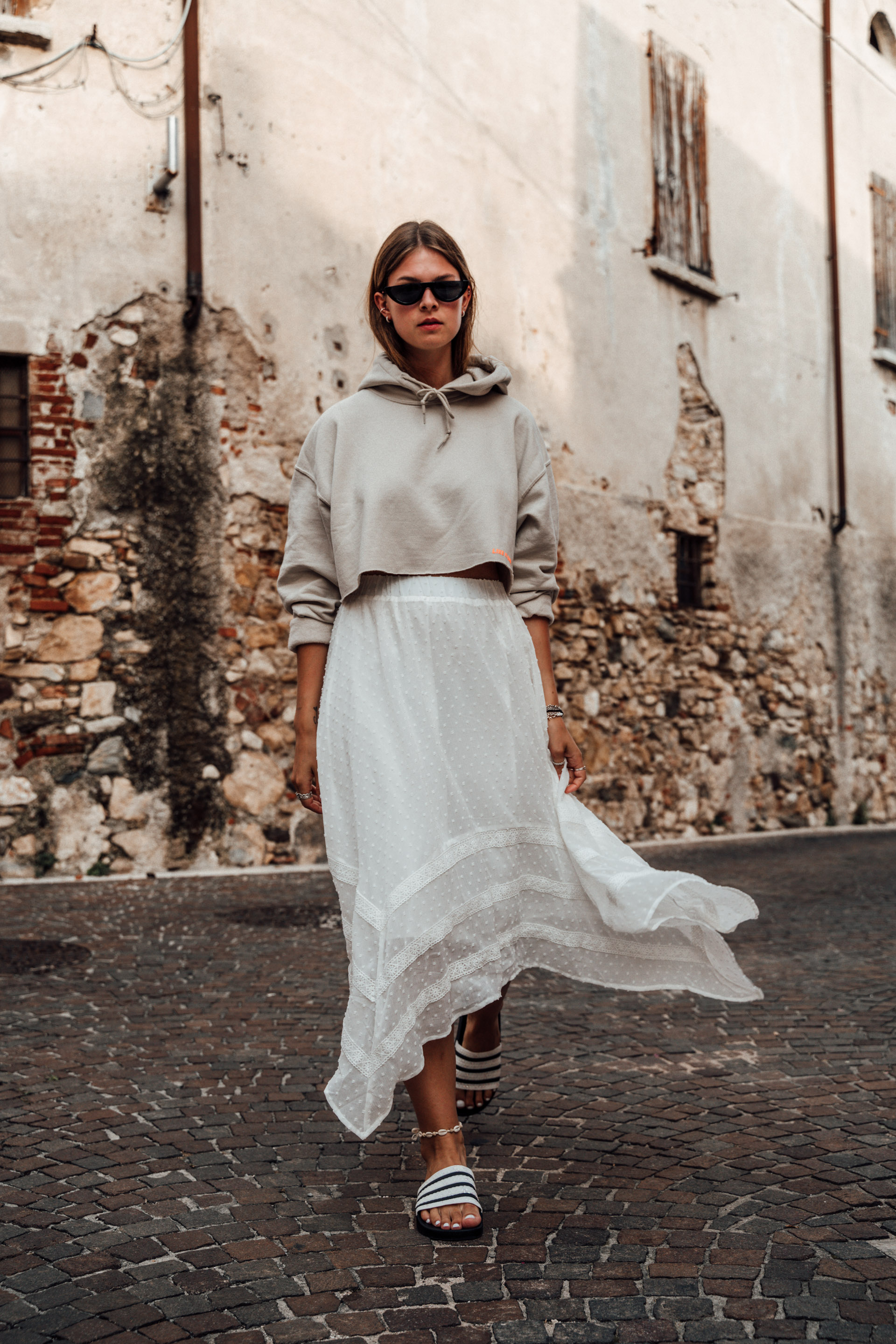 Cropped Hoodie combined with an Asymmetric Skirt Fashionblog Berlin